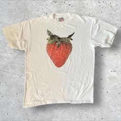 Strawberry Graphic Tee - Fresh Fruit-Inspired Casual Fashion Add a touch of freshness to your wardrobe with this tee featuring a bold strawberry graphic. Ideal for those who love fruity and fun designs. 👕 Material: 100% Cotton 🎨 Design: Bold Strawberry Graphic 📏 Sizes: M-3XL ⏳ Custom Creation Time: Please allow 1-2 weeks for production. #StrawberryTee #FruitFashion #GraphicTshirt #CasualWear #CustomApparel #UniqueFashion T Shirt Sleeve Design, Cotton T-shirt With Strawberry Print, Cotton Short Sleeve T-shirt With Strawberry Print, White Relaxed Fit T-shirt With Strawberry Print, White T-shirt With Fruit Design For Spring, White T-shirt With Strawberry Print For Spring, Vintage Strawberry Print Short Sleeve T-shirt, Casual White T-shirt With Strawberry Print, White Short Sleeve Tops With Fruit Design