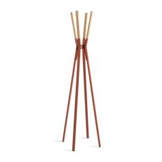 a tall wooden floor lamp with three candles on it's legs and one candle in the