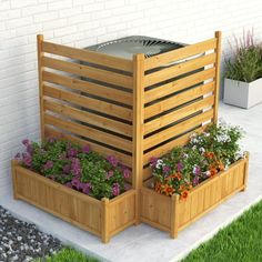 an outdoor planter with flowers and plants in it