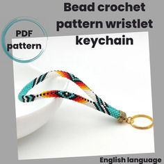 the bead crochet pattern wristlet keychain is shown in multicolors