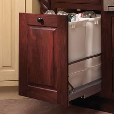 an open dishwasher drawer in a kitchen