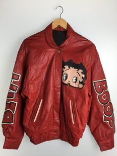 Betty Boop Red Cartoon Leather Jacket The post Betty Boop Red Cartoon Leather Jacket appeared first on Jackets Land. Red Retro Leather Jacket For Streetwear, Betty Boop Leather Jacket, Red Vintage Leather Jacket For Streetwear, Vintage Red Leather Jacket For Streetwear, Red Vintage Leather Jacket, Red Leather Motorcycle Jacket, Red Vintage Leather Jacket With Long Sleeves, Vintage Red Leather Outerwear, Betty Boop Cartoon