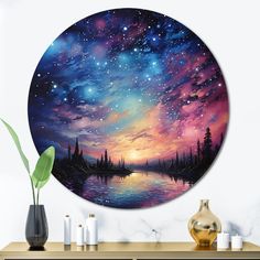 a painting on the wall of a room with a lake and stars in the sky