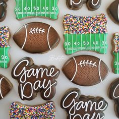 decorated football cookies with game day written on them