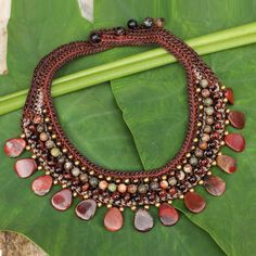 Knitted Choker Necklace with Brown and Red Gems - Fantastic Earth | NOVICA Handmade Bohemian Jasper Necklaces, Handmade Brown Bohemian Choker, Brown Macrame Nature-inspired Jewelry, Bohemian Brown Choker For Gift, Nature-inspired Brown Macrame Jewelry, Bohemian Burgundy Beaded Jewelry, Bohemian Brown Jasper Jewelry, Handmade Brown Hippie Choker, Unique Brown Macrame Necklace