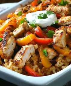 chicken and rice dish with sour cream on top