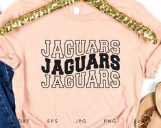 a t - shirt with the words jaguars, jaguars, and tigers on it