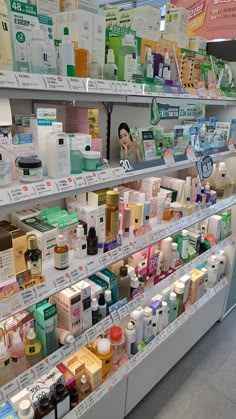 shelves in a store filled with lots of different types of skin care products on display