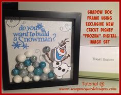 there is a frame that has some balls in it and the words do you want to build a snowman?