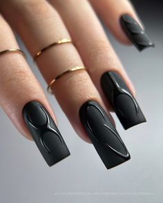 This nail design perfectly balances matte and gloss textures for a sophisticated and modern look. The matte black base is accented with glossy 3D geometric patterns, creating a striking contrast. The long, square-shaped nails provide an ideal canvas for this design, making it a statement piece for any occasion. Nail Ideas Square Black, Matte And Gloss Nails Design, Red Black Matte Nails, Matte Black Nails Design Ideas, Black Nail Matte And Glossy, Black Nail Designs Coffin Shape, Black Matte And Gloss Nails, Black Square Nails Long, Black Nails Matte And Glossy