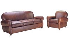 two brown leather couches sitting next to each other on top of a white background