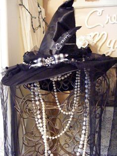 an image of a hat with pearls on it