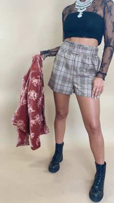 The Poise In Plaid Shorts in Camel/Burgundy is a stylish addition to your wardrobe. These plaid shorts offer a trendy, fashion-forward look. A chic and comfortable choice for various occasions. Plaid shorts with brown/burgundy Comes with an adjustable belt Magenta, brown, black, tan, and cream tones Fabric: 98% Polyester, 2% Spandex Imported Measurements: S: Inseam: 2.5" - M: Inseam: 2.75" - L: Inseam: 3" Model Specs: Emily is wearing a size small in the photo. How will this item fit you? Check out our MODEL SPECS (Typical Sizing - Karli: S-Size 5/26 - 5ft 2in, Emily: S-Size 3/25 - 5ft 5in, Syd: L/XL- Size 15/ - 5ft 8in)Need help with sizing? No problem! Join our VIP group on Facebook, Everyday Chic Boutique VIP Insiders to chat directly with our team and other customers just like you.Pack Cream Tones, Vip Group, Everyday Chic, Plaid Shorts, Adjustable Belt, Chic Boutique, Black Tan, Trendy Fashion, Womens Bottoms