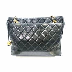 Elevate Your Style With This Iconic Chanel Tote! Crafted In Black Lambskin With A Stunning Quilted Pattern, Chain-Link Accents, And Gold-Tone Hardware, It Exudes Sophistication. The Dual Functionality Of Chain-Link And Lambskin Straps, With Black Leather Lining And Dual Zippered Pockets, Adds Practicality To The Elegance. The Gentle, Relaxed Shape, Minor Scuffs, And Slight Tarnishing On The Hardware Only Enhance Its Vintage Charm. This Authentic Masterpiece Stands At 9.25" In Height And 12" In Width, And Features A 15" Shoulder Strap Drop. A Third Party Has Authenticated This Item. Rare! This Item Is Exceptionally Rare To Find For Sale. Don't Miss Out On Owning This Character-Rich, Timeless Chanel Tote, Chanel Purse, Quilted Pattern, Third Party, Timeless Classic, Vintage Charms, Chain Link, Vintage Black, Quilt Patterns