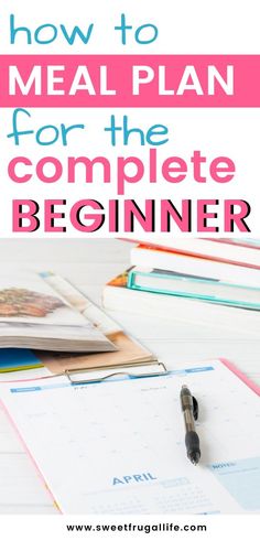 the meal plan for the complete beginner is shown with a pen and notebook on top