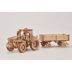 a wooden model of a tractor and trailer