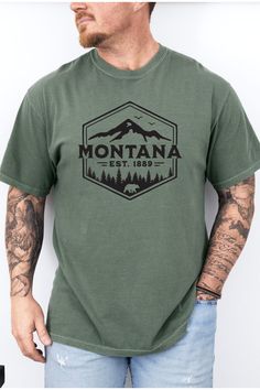 These simple yet stylish Montana badge t-shirts are great for women or men. Whether you have love for Montana, you've been on vacation here, or you want to gift these t-shirts to someone for a holiday these are a great option. These are made in a unisex style Comfort Colors tee that does run a bit larger than normal. Keep in mind that they are 100% cotton so they do shrink some, but they are pigment dyed and get softer with every wash. Montana Vacation Outfits, Wrestling Mom Shirts, Band Mom Shirts, Montana Style, Girl Mom Shirt, Montana Vacation, Dance Mom Shirts, Basketball Mom Shirts, Volleyball Mom Shirts