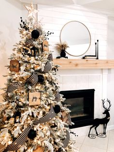 a decorated christmas tree with black and white ornaments