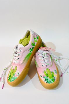 For Cactus Lovers. Hand painted, original Vans Era (Double light gum) pink sneakers.  Each shoe is custom and 100% unique, something only you will have. This pair inspired from Canary Islands where I am living and we have lot of cactuses. Painted with permanent colours and markers. Customised shoe laces with colour splashes. I am using best quality colours and materials for my original shoes so they looking good as long as possible. But still, please, handle with care :). Comes with original Vans shoe box. Women Size US6.0/UK3.5/EUR36.0/CM22.5 Pink Casual Custom Sneakers With Vulcanized Sole, Pink Casual Custom Sneakers For Spring, Casual Pink Custom Sneakers For Spring, Spring Casual Pink Custom Sneakers, Casual Pink Custom Sneakers With Round Toe, Custom Pink Sneakers With Vulcanized Sole For Spring, Pink Custom Sneakers With Vulcanized Sole For Spring, Spring Pink Custom Sneakers With Vulcanized Sole, Casual Hand-painted Lace-up Custom Sneakers