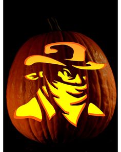 a pumpkin with an image of a man wearing a hat