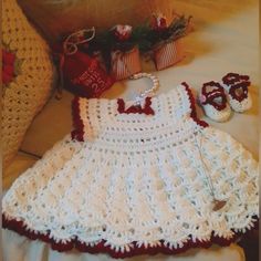 Get Your Little One Ready For Their First Christmas Party With This Adorable Dress And Maryjanes Set! The Dress, Made By The Angry Crocheter, Features A Fit And Flare Style With A Long Length In A White Color With A Red Trim That Is Perfect For The Holiday Season. The Dress Is Designed For Baby Girls Aged 0-3 Months And Is Sure To Make Them The Belle Of The Ball. The Set Also Includes A Pair Of Matching Maryjane Shoes To Complete The Look. Perfect For Any Christmas Occasion Or Party, Your Baby W Dress And Mary Janes, Girl Frock, Baby's 1st Christmas, Frocks For Girls, 1st Christmas, Mary Jane Shoes, Christmas Dress, Kids' Dresses