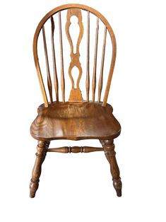 an old wooden chair on a white background