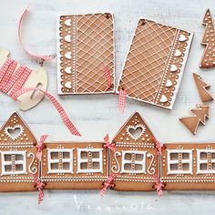 gingerbread cutouts and decorations on a white table