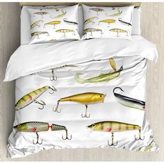 the bed is covered with different types of fishing lures