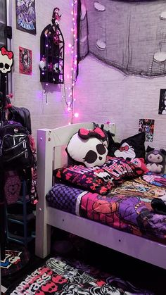 a bedroom with hello kitty decorations on the walls