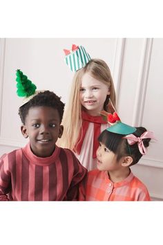 Forget plain party hats, our set of creatively designed beautiful hats are perfect for festive photo opportunities. Your Instagram page will be the envy of all your friends! Each set includes 6 different hats with 3D Christmas trees, holly and gifts, all in jolly colors of red, green and gold with foil and ECO glitter details.6 hats with different designs and colors - 2 holly, 2 Christmas trees and 2 giftsThe hats are flat packed, and come with an instruction sheet on how to easily construct the Christmas Party Hats, Christmas Tree Hat, 3d Christmas Tree, Christmas Mix, Paper Bow, Different Hats, Meri Meri, Christmas Party Supplies, 3d Christmas