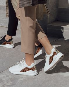 Style on and off the clock with LX. Featuring premium vegan leather, an iconic leopard print, and golden details, LX kicks off our new era of elegance and exceptional comfort. Add a new neutral with a pop of animal print as you seamlessly shift from morning rounds to dinner reservations in our most luxurious sneaker style. Plus, every LX box includes a dust bag to protect and carry your pair! Slip-on Low-top Sneakers With Speckled Midsole, Trendy Fall Sneakers With Perforated Toe Box, Fall Lace-up Sneakers With Cushioned Footbed, Fall Lace-up Sneakers With Boost Midsole, Modern Slip-on Sneakers For Fall, Low-top Sneakers With Boost Midsole For Fall, Fall Low-top Sneakers With Speckled Midsole, Low-top Fall Sneakers With Speckled Midsole, Low-top Sneakers With Speckled Midsole For Fall