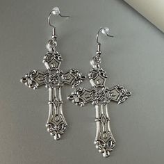 Vintage Gothic Cross Earrings Antique Silver Earrings Unisex Women Men Brand New *Brand New *Handmade *Measure 7cm X 4cm *Lightweight *Silver Plated Cross. *Stainless Steel Hooks. *Ships Within 24 Hours Of Purchase Monday-Saturday Grunge Cross Earrings, Big Cross Earrings, Gothic Cross Earrings, Cross Jewelry Aesthetic, Jewelry Aesthetic Earrings, Whimsigoth Witch, Silver Cross Earrings, Vintage Silver Earrings, Earrings Cross