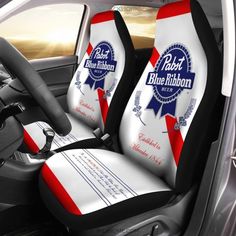 two red white and blue seats in a car