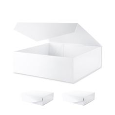 an open white box with three pieces of paper on the bottom and one piece in the middle