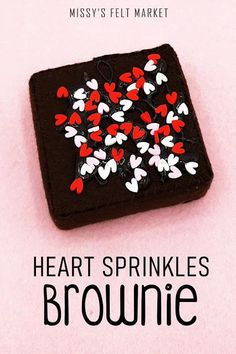 heart sprinkles brownie on pink background with misssy's felt market