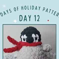 a crocheted penguin with a red scarf around its neck and the words days of holiday pattern day 12