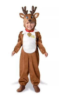 a little boy dressed up in a reindeer costume