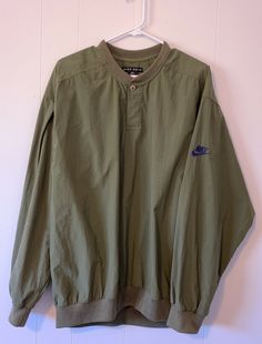 VINTAGE NIKE GOLF WINDBREAKER MENS L GREEN PULLOVER JACKET Embroidered Nike Logo. This jacket is an overall good condition but there is a slight flaw and it is on the right arm on the inside part. It appears to be a possible bleach stain but again it is on the inside of the arm and can barely be seen when worn. Please see second to last photo to see what I am talking about. Please see last photo for all measurements to ensure that this pull over fits. Green Crew Neck Outerwear For Outdoor, Green Nike Windbreaker For Sports, Nike Green Long Sleeve Windbreaker, Vintage Green Windbreaker For Sports, Nike Green Spring Windbreaker, Nike Green Casual Windbreaker, Casual Green Nike Windbreaker, Embroidered Nike Logo, Embroidered Nike