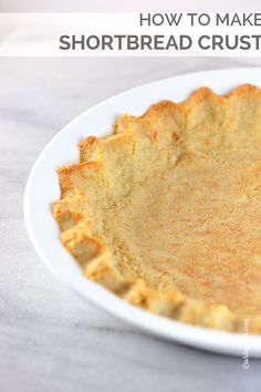 an uncooked pie crust on a white plate