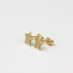 Minimalist gold star stud earrings, handmade of yellow 14k solid gold, with a highly shiny finish. These gold star studs are perfect for every occasion, great for any age.Chic and stylish, a wonderful gift for yourself or for someone you love.Star’s hight is ~8.5  mm = ~0.33  inchStar’s width is ~8.5  mm = ~0.33  inch14k solid gold ear backs are included.* The earrings will be packed in a gift box ready to give as a gift, and shipped via Express mail service which usually takes 5-8 business days Minimalist Yellow Gold Star Earrings, Dainty Yellow Gold Star Earrings, 14k Gold Star Earrings Gift, Minimalist Gold Star Earrings, Gold Star-shaped Minimalist Earrings, Modern Gold Earrings, Gold Ear Studs, Gold Star Earrings, Star Stud Earrings