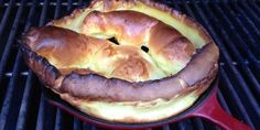 a hot dog bun sitting on top of a grill