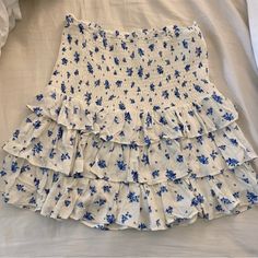 New With Tags Floral Ruffle Skirt. Size Small But I’d Say Fits Medium As Well Since It Is Stretchy And Very Comfortable. Originally Purchased From Free People. Blue Ruffle Hem Skirt For Vacation, Blue Ruffled Mini Skirt For Brunch, Blue Tiered Bottoms For Vacation, White Tiered Bottoms For Day Out, Casual White Tiered Bottoms, White Tiered Skirt With Floral Print, Grass Skirt, Godet Skirt, Purple Floral Dress