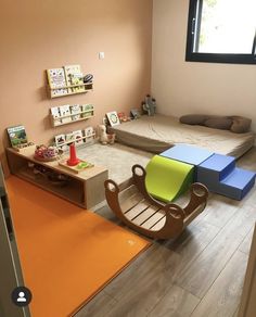 a child's room with two beds and toys