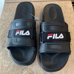 Men’s “ Fila” Adjustable-Slide-Sandals, Slip-On. Color: Black. Size: 8m. Never Used Them!! This Sandals Could Be Use By A Female Too Black Slide Sport Sandals, Synthetic Slide Flip Flops For Streetwear, Black Slides With Rubber Sole For Vacation, Cushioned Slide Flip Flops For Streetwear, Black Beach Slides, Red Fila Shoes, Black Fila Shoes, Water Shoes For Men, Fila Shoes