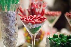 candy and candies are arranged in glass vases