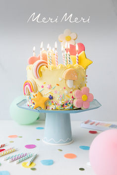 Colorful birthday cake decorated with flower, mushroom, heart and star sugar cookies and sprinkles. Cute Sugar Cookies, Rainbow Birthday Cake, Girl Birthday Themes, Balloon Cake, Meri Meri, Rainbow Sprinkles, Colorful Cakes, Diy Cake