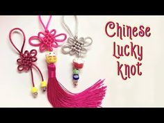 the chinese lucky knot is decorated with beads and tassels, along with other accessories