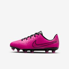 a pink soccer shoe with black detailing on the upper part and bottom part, in front of a white background