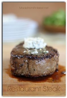 the steak is topped with cottage cheese on top