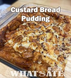 a square casserole dish with bread pudding in it on a wooden table and the words custard bread pudding written below